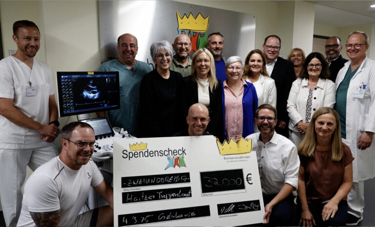 Spendenuebergabe Treppenlauf